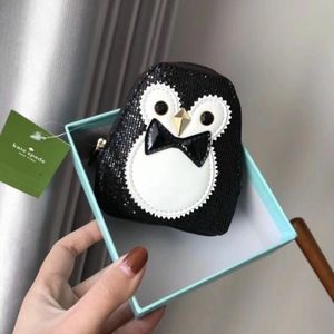 ISO: Kate Spade penguin coin purse
